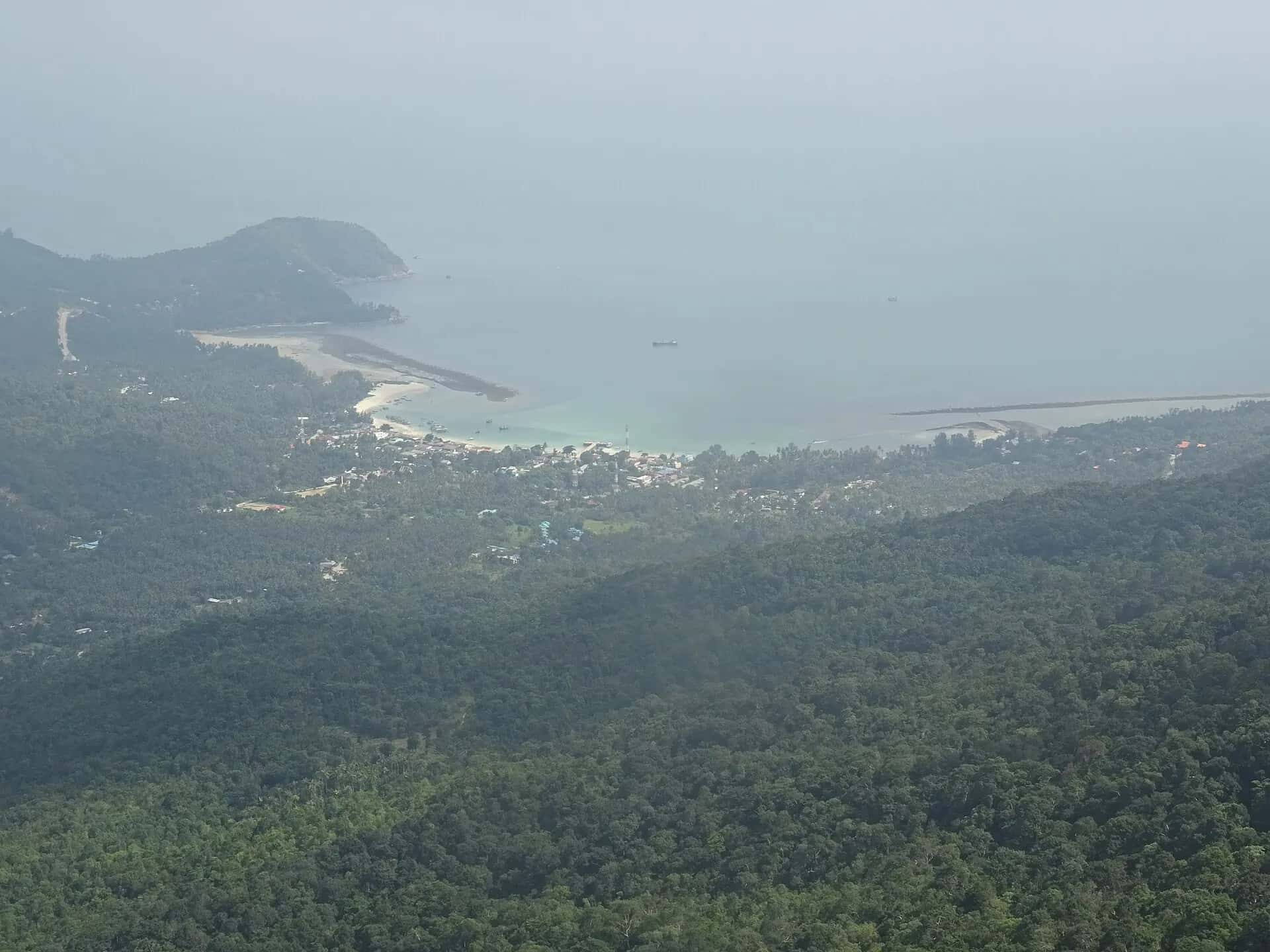 View from Khao Ra over the forested hills down to Chalok Lam bay
